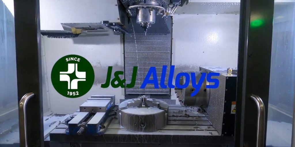 J&J Alloys Logo superimposed over a J&J Alloys CNC machine in action.