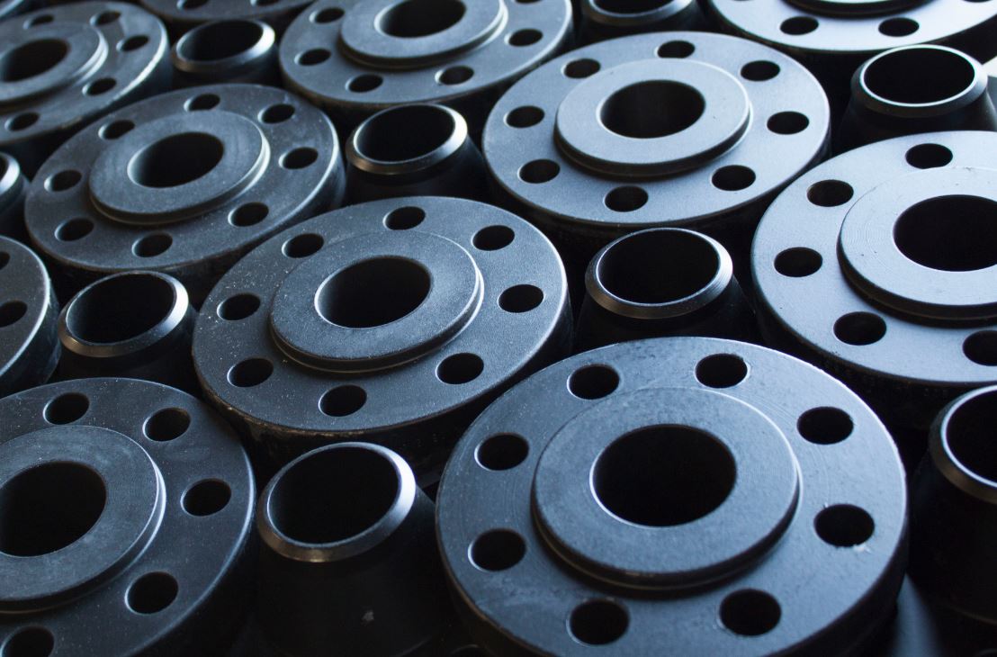 Carbon steel flanges in a Dodson Global warehouse.